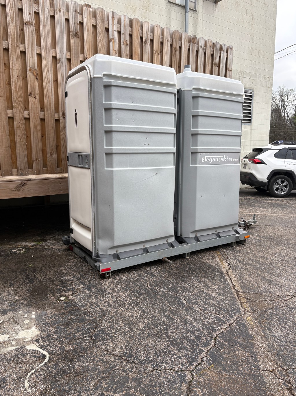 Luxury restroom trailer interior with vanity and finished walls